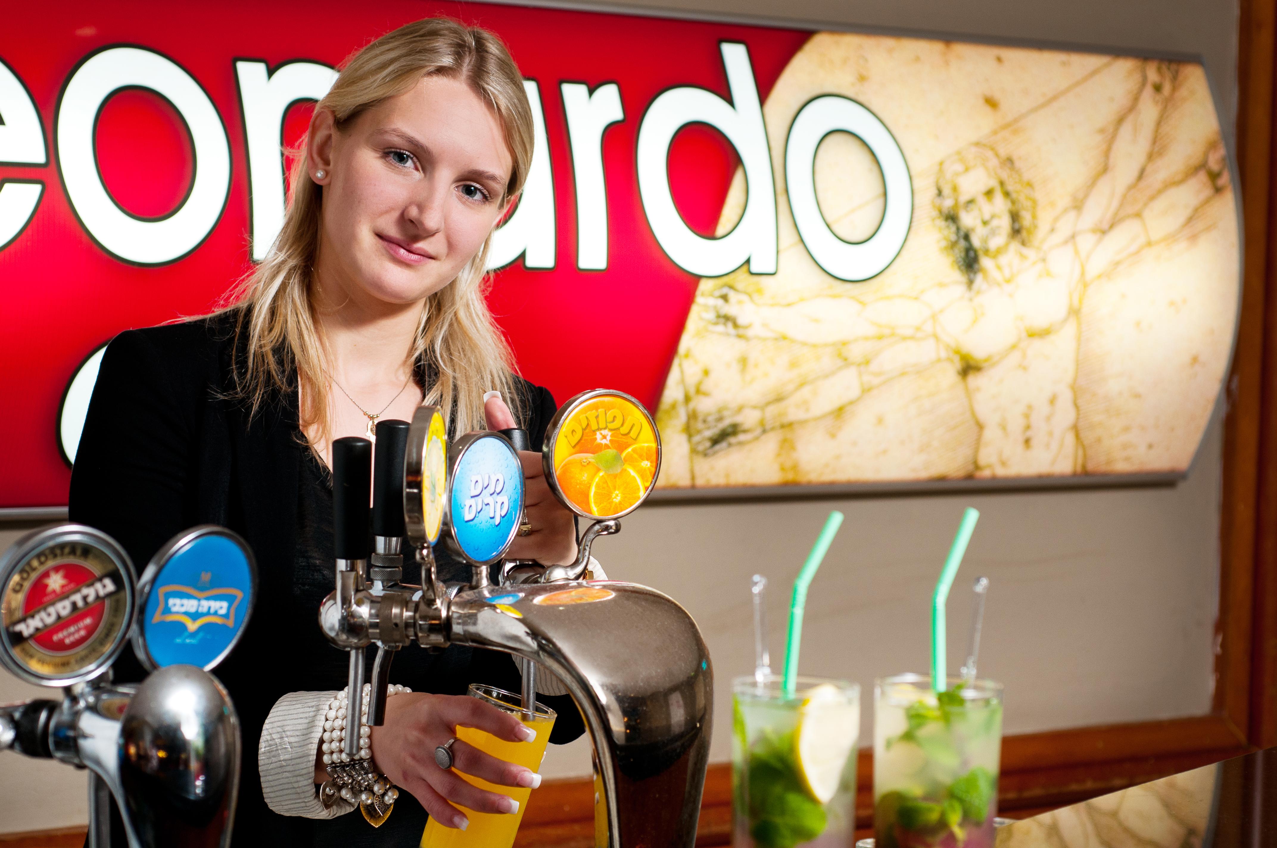 Leonardo Club Hotel Dead Sea Neve Zohar Exterior photo A bartender at work